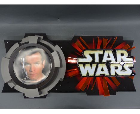 Star Wars point of sale shop display sign with interchangeable portrait posters 100 x 50cm together with a similar embossed s