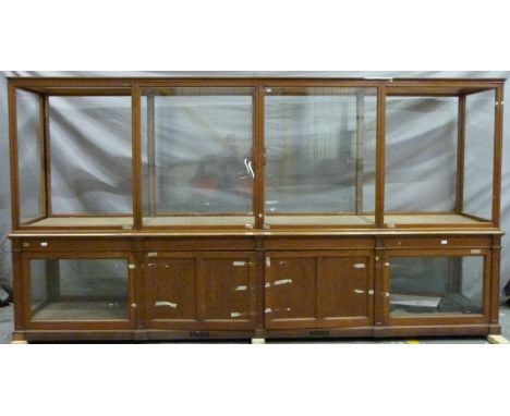 Ex Victoria & Albert Museum early 20thC mahogany four bay glass display cabinet with glazed upper section and ceiling panels,