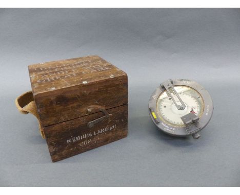 A medium landing compass with military marks 6B/34 in original wooden case