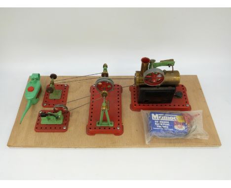 Mamod live steam stationary engine with line shaft, polishing wheel and hammer, mounted on wooden board 