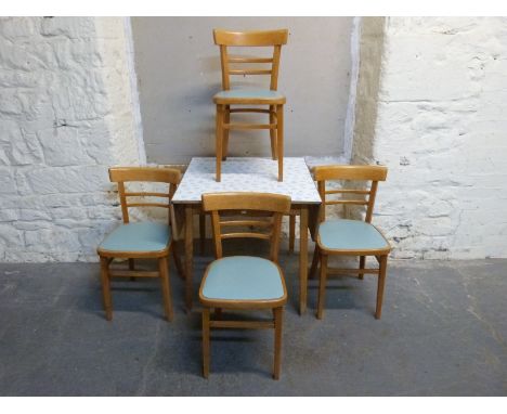 A modern oak extending dining table max L180 min 90, W90, H77 and four solid seat chairs 