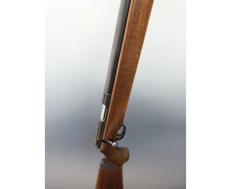 Walther U.I.T .22 bolt action target rifle with adjustable trigger, sight mount, shaped semi-pistol grip and 28 inch barrel, 