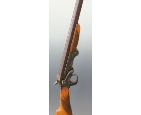 Belgian .410 single barrelled hammer action folding poacher's gun with chequered grip and forend, raised disc front sight and