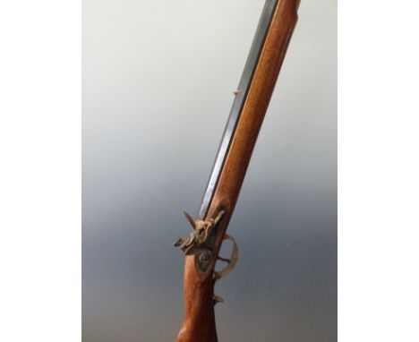 Pedersoli .45 Kentucky style flintlock hammer action rifle with brass mounts, trigger guard and butt plate, storage compartme