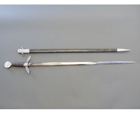 A replica Nazi German Luftwaffe officer's sword marked 0216117 to quillon, blade 78cm in leather covered scabbard