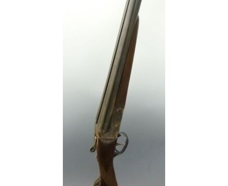 AYA 12 bore side by side ejector shotgun with named and engraved lcoks, chequered grip and forend, engraved top plate, top le