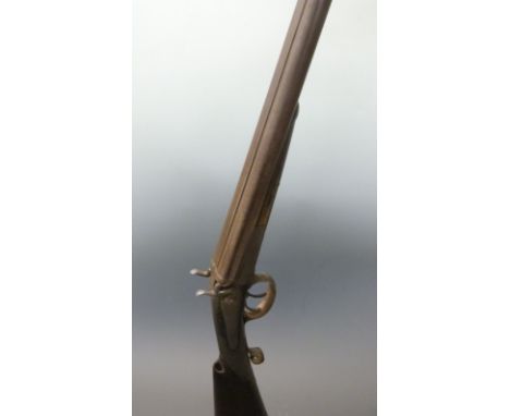 Beringer System side by side hammer action shotgun with engraved locks, butt plate, forend, top plate and scrolling rotary tr