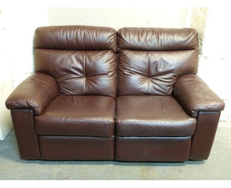 A leather two seater sofa with electric reclining facility