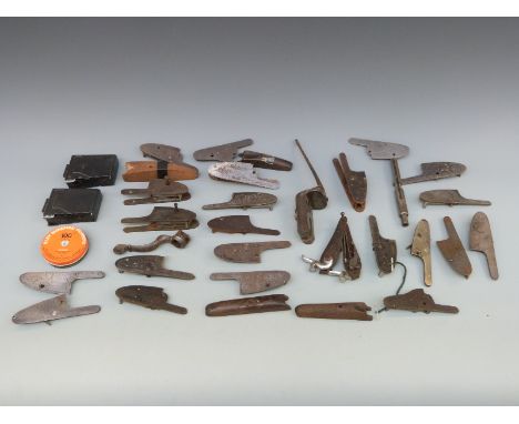A large collection of various gun parts including lock plates, magazines etc 