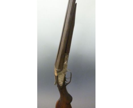 Baker Gun Company 12 bore side by side sidelock shotgun with engraved locks depicting scenes of birds and dogs and border eng