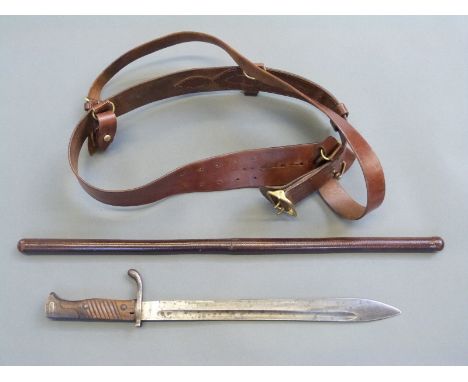 WWI leather 'Sam Brown' belt and swagger stick and a Simson and Co Suhl German bayonet, blade length 36cm