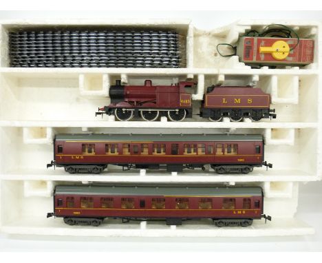 0 gauge Lima 4 J steam locomotive and two carriage set 