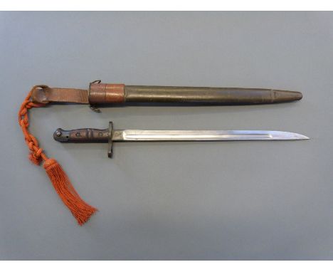 British P13 bayonet taken up by the US as the M1917 with added clearing hole to pommel, modified scabbard top mount for the a