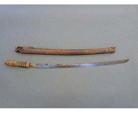 Japanese shin gunto katana Samurai sword with cord bound shagreen handle,  leather covered wooden scabbard and 65cm signed bl