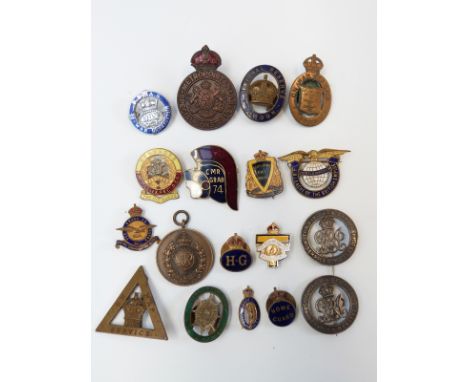 A collection of military enamel and other badges to include Worcestershire Old Comrades and Rats of Tobruk and BSAS War Comfo