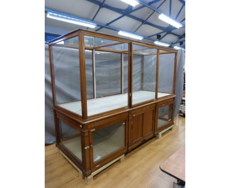 Ex Victoria & Albert Museum early 20thC mahogany three bay display cabinet with glazed upper section and ceiling panels and l