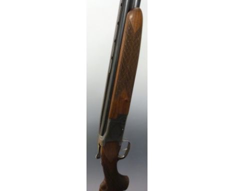 Laurona 12 bore over and under shotgun with florally engraved locks, top lever, top plate underside and trigger guard, double