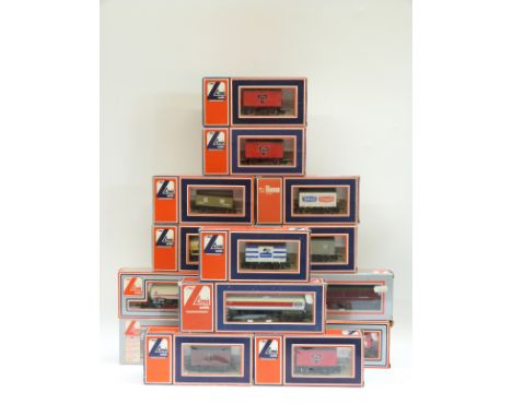 Fourteen Lima 00 gauge wagons, vans and tankers, all in original boxes
