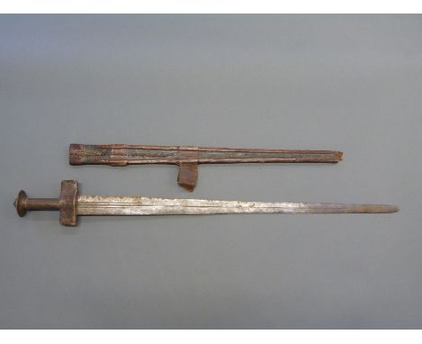 A 19th/20thC Eastern sword with copper pommel in tooled leather scabbard, 90cm 