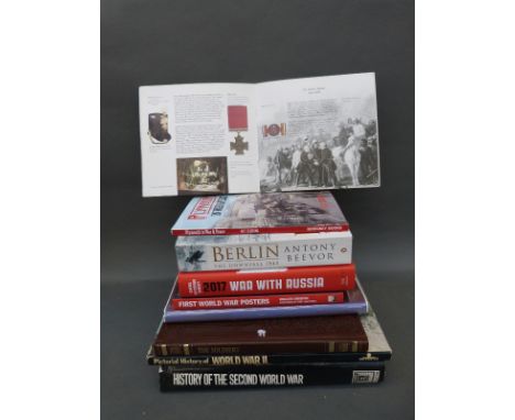 A collection of military books to include a signed copy of 'The Cherry Pickers' 11th Hussars (Prince Albert's Own) 1715-1969,