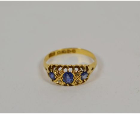 An 18 carat gold sapphire and diamond ring, finger size P1/2  NB one diamond deficient .  Hallmarked Chester 1905. Gross weig