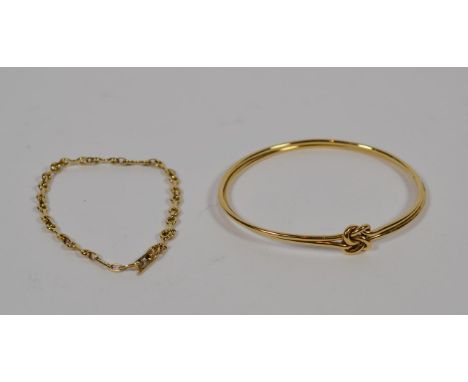 A 9 carat gold bangle and a bracelet, stamped '375' and '9CT' length 18cm.  Gross weight 20.1 grams. 