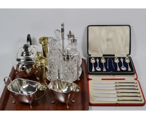 A small quantity of silver and silver plate including a cased set of silver knives, teaspoons, walking stick; and a plated te