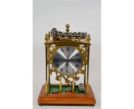 Ferris wheel ball bearing driven mantel clock