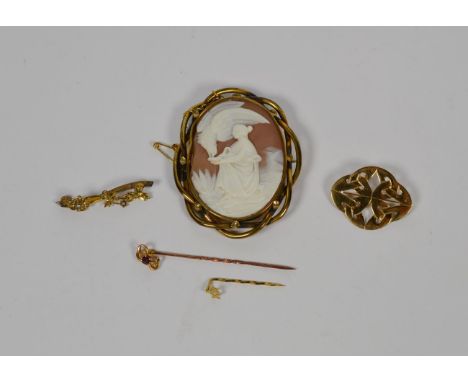 A cameo brooch depicting Hebe (a.f.); two 9 carat gold brooches; and two stick pins.  Cameo brooch - 22.0 grams. Two 9 carat 