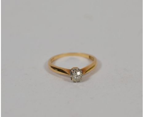 An old cut diamond solitaire ring, stamped 'PLAT &amp; 9CT', finger size J1/2.  Gross weight 1.8 grams. 