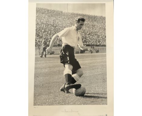 Football. Tom Finney Signed 23 x 16 inch Black and White Big Blue Tube Print. Minimal Damage to Edges. Rolled. Good condition
