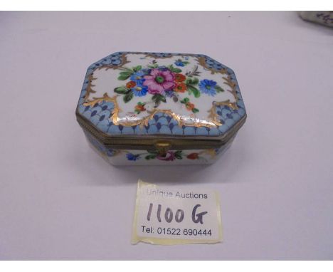 A 19th century porcelain trinket box. 
