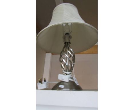 A modern table lamp with shade. 