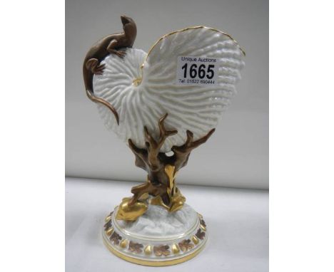 A Royal Worcester Nautilus Lizard shell vase (a/f minor chip to rim).Small chip to rim, height 22.5cm base diameter 12cm