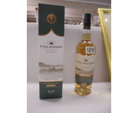 A boxed Finlaggan old reserve Islay single malt scotch whisky. 