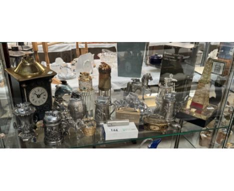 A collection of ornate vintage lighters