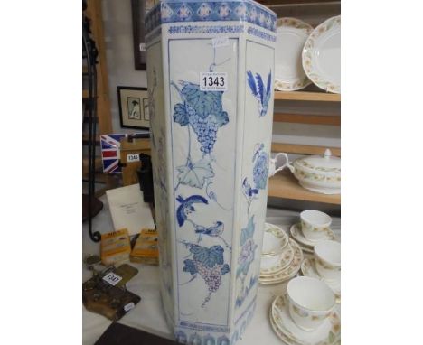 A Chinese style stick stand. COLLECT ONLY. 