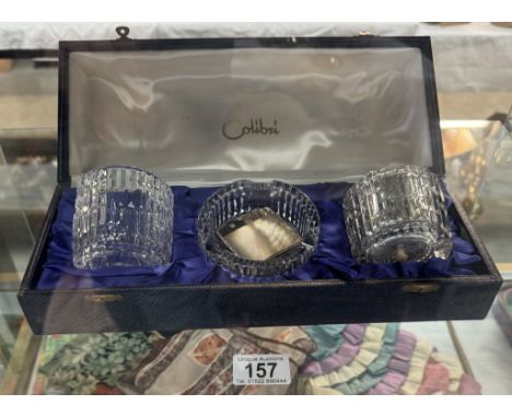 A cased Colibri Webb Corbett crystal glass drinks smoking set including lighter, tumbler and a Rowenta snip 925 silver lighte