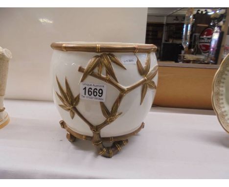 A Royal Worcester porcelain bamboo planter/vase. Height 19.5cm small chip to one foot