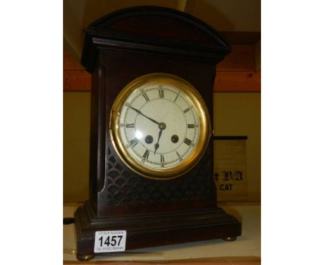 An early 20th century oak eight day mantel clock in working order. 