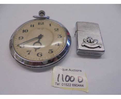 WW2 related - A large Smith's pocket watch with inscription 1943 and a lighter with inscription 1944. 