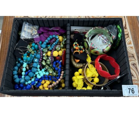 A Large collection of brightly coloured vintage jewellery including earrings, bracelets, necklaces etc
