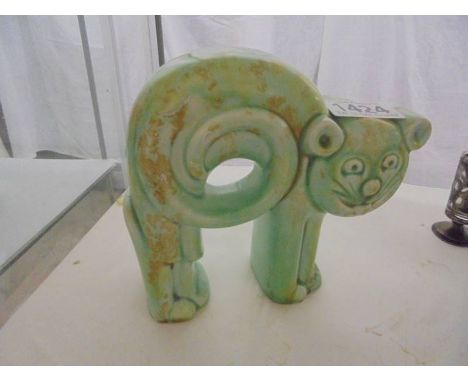 An unbranded art deco stylised pottery cat ornament, 14.5 cm tall. 
