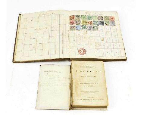 A mid 19th century Victorian album of definitive postage stamps. The album with manuscript calligraphy &amp; stamps pasted in