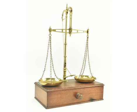 Avery - a late 19th century Victorian set of brass and oak scales. The scales complete with pedal to raise the scales, set ov