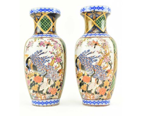 A pair of Chinese vintage ceramic vases. Each baluster shaped vase decorated with geometry and floral motif on the neck, peac