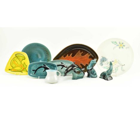 Poole Pottery - a collection of ten vintage mid century circa 1970s ceramics. The lot comprising a dolphin figurine and two s