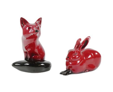 Royal Doulton - Flambe - two ceramic Flambe pattern animals - a seated fox, and a seated hare. Both with maker's marks to und