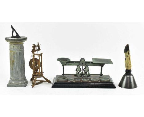 A collection of four 19th century &amp; later Victorian models and collectables. The lot comprising a model desk top sundial 