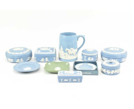 A collection of 20th century Wedgwood Jasperware pale blue and green pieces.The lot to include two scalloped shaped trinket b